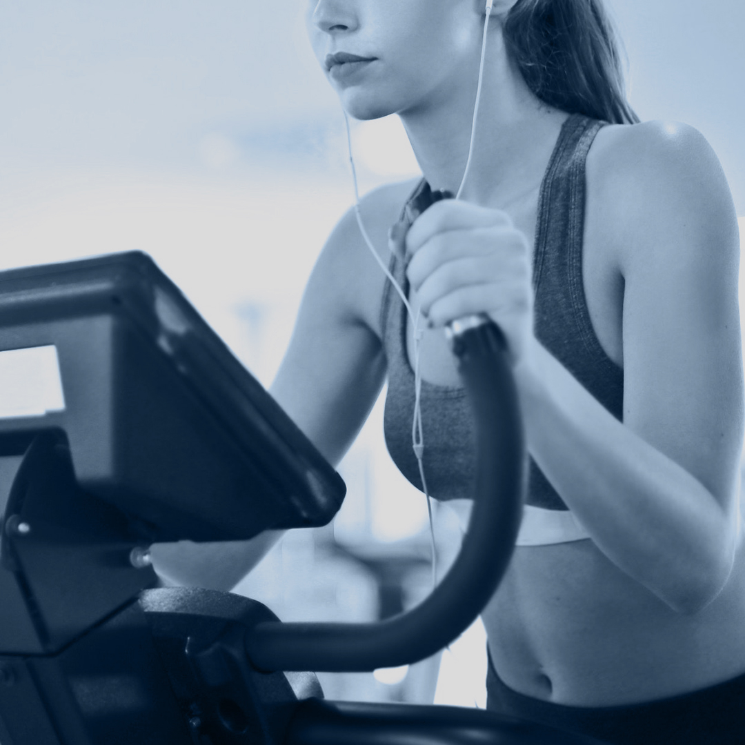 Woman using cardio equipment at Radisson Blu Limerick Fitness Club