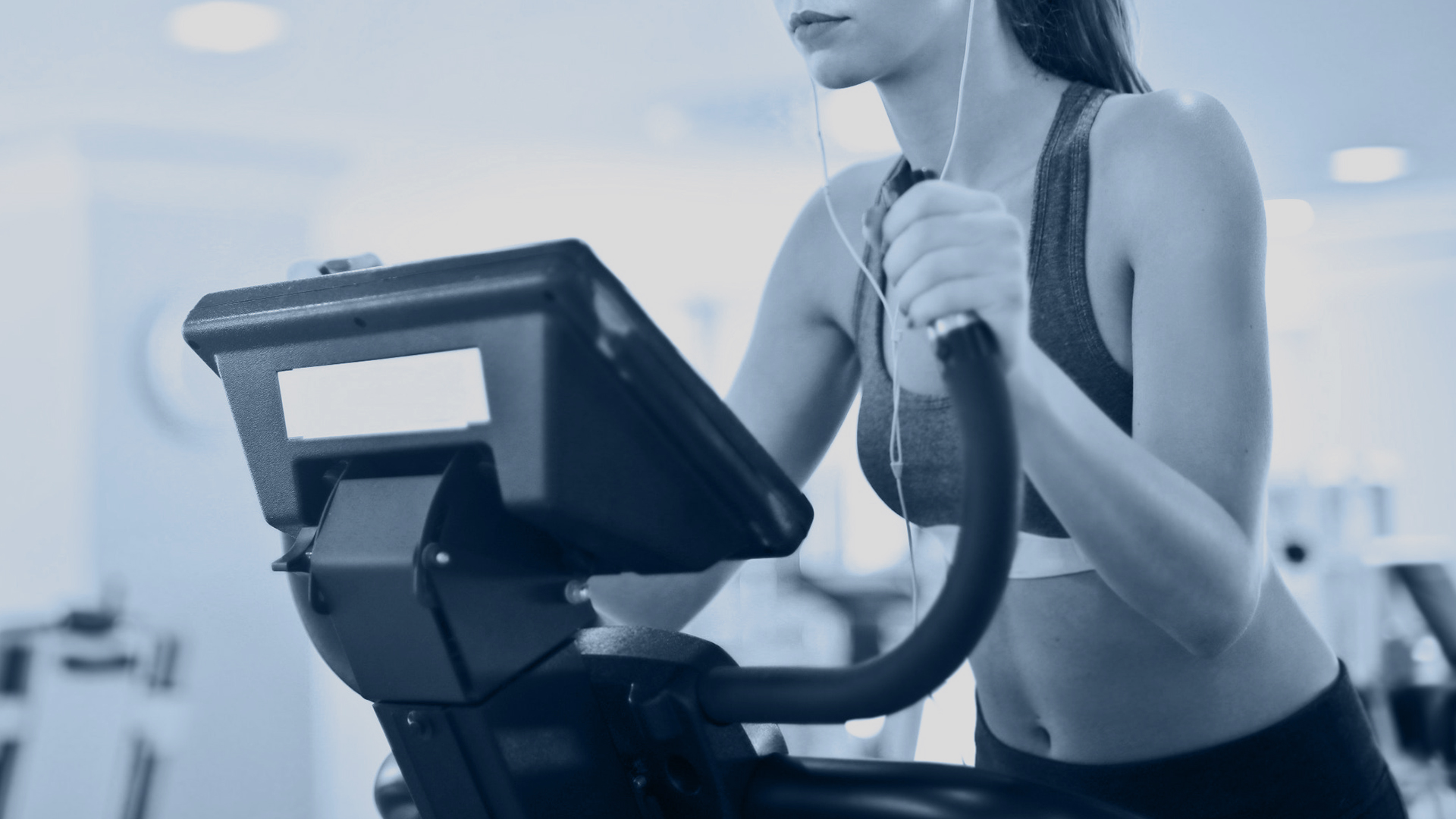 Woman using cardio equipment at Radisson Blu Limerick Fitness Club